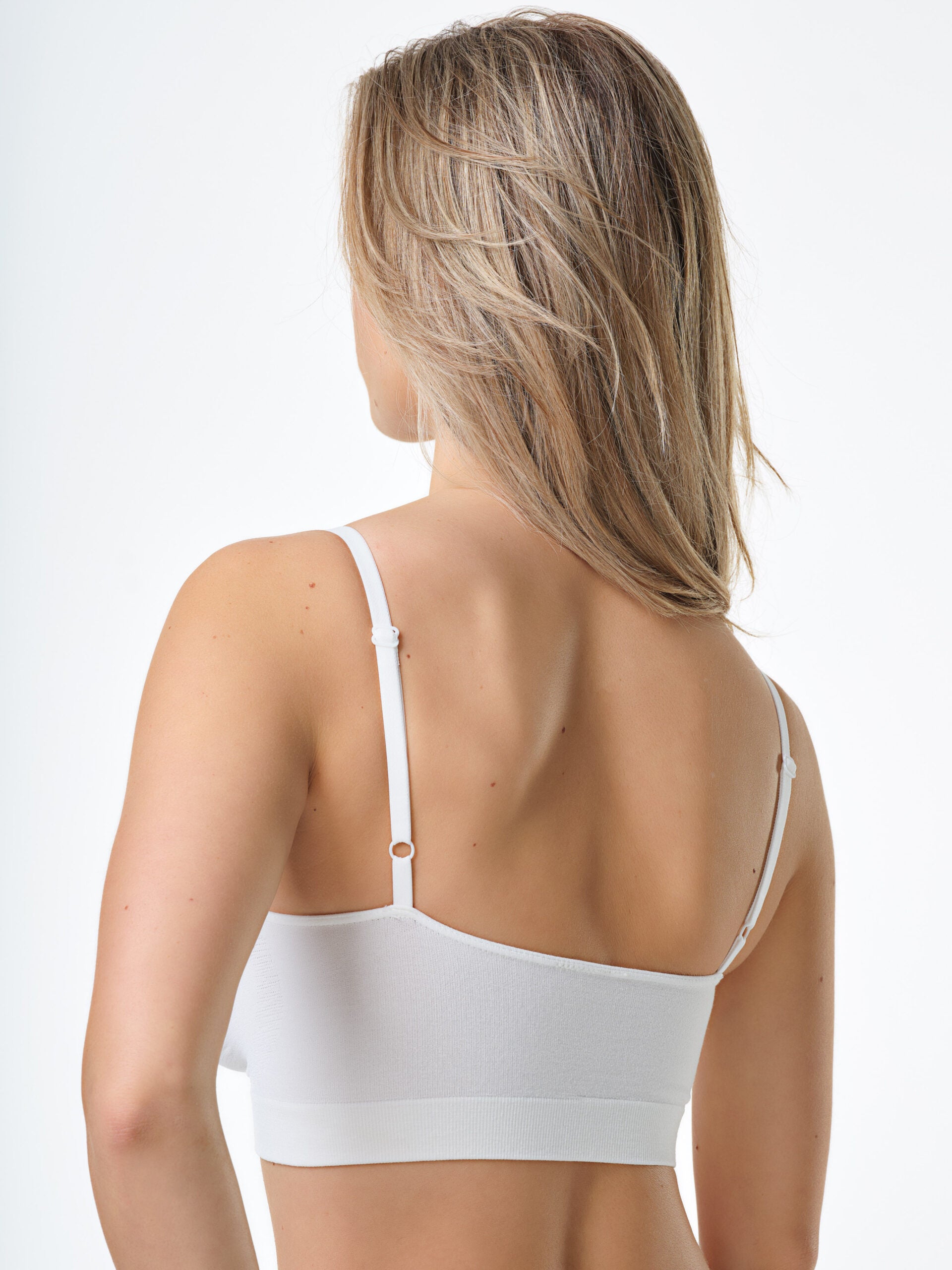 Bralette bianca con spalline regolabili in fibra di bamboo, vista posteriore.