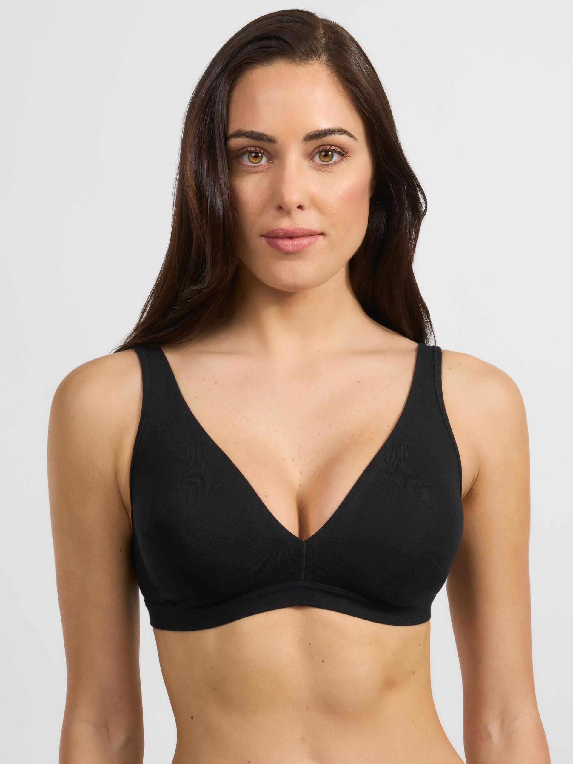 Reggiseno nero in cotone elasticizzato modello vela con coppe preformate.