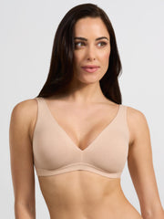 Reggiseno cotone elasticizzato nudo, modello vela con coppe preformate.