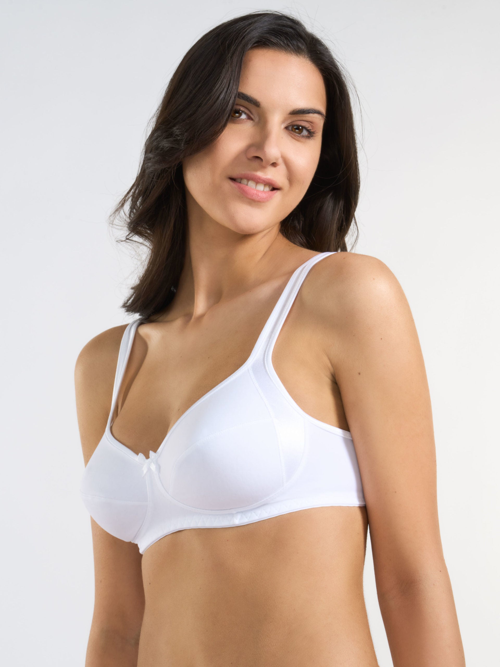 Reggiseno bianco in tessuto elasticizzato con inserti in raso, modello 2291.