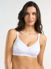 Reggiseno bianco in tessuto elasticizzato con dettagli in pizzo e spalline regolabili.