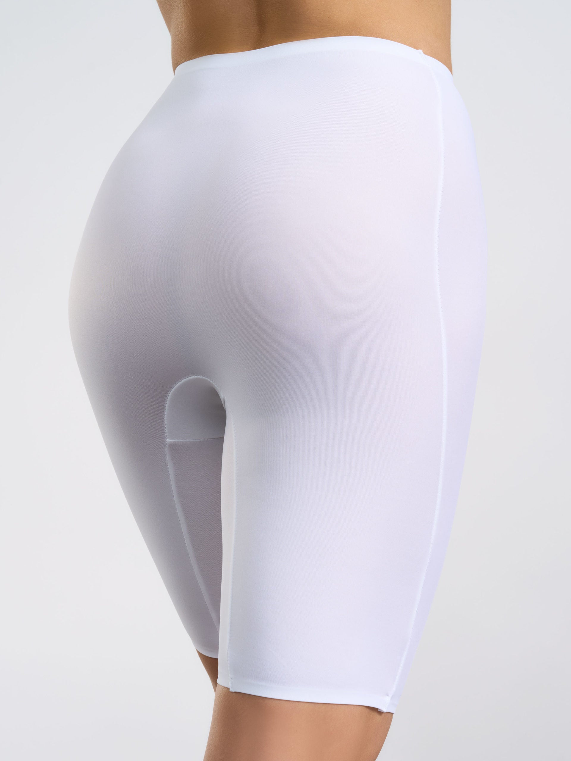 Guaina anti-sfregamento bianca in microfibra termonastrata, lunghezza sopra il ginocchio.