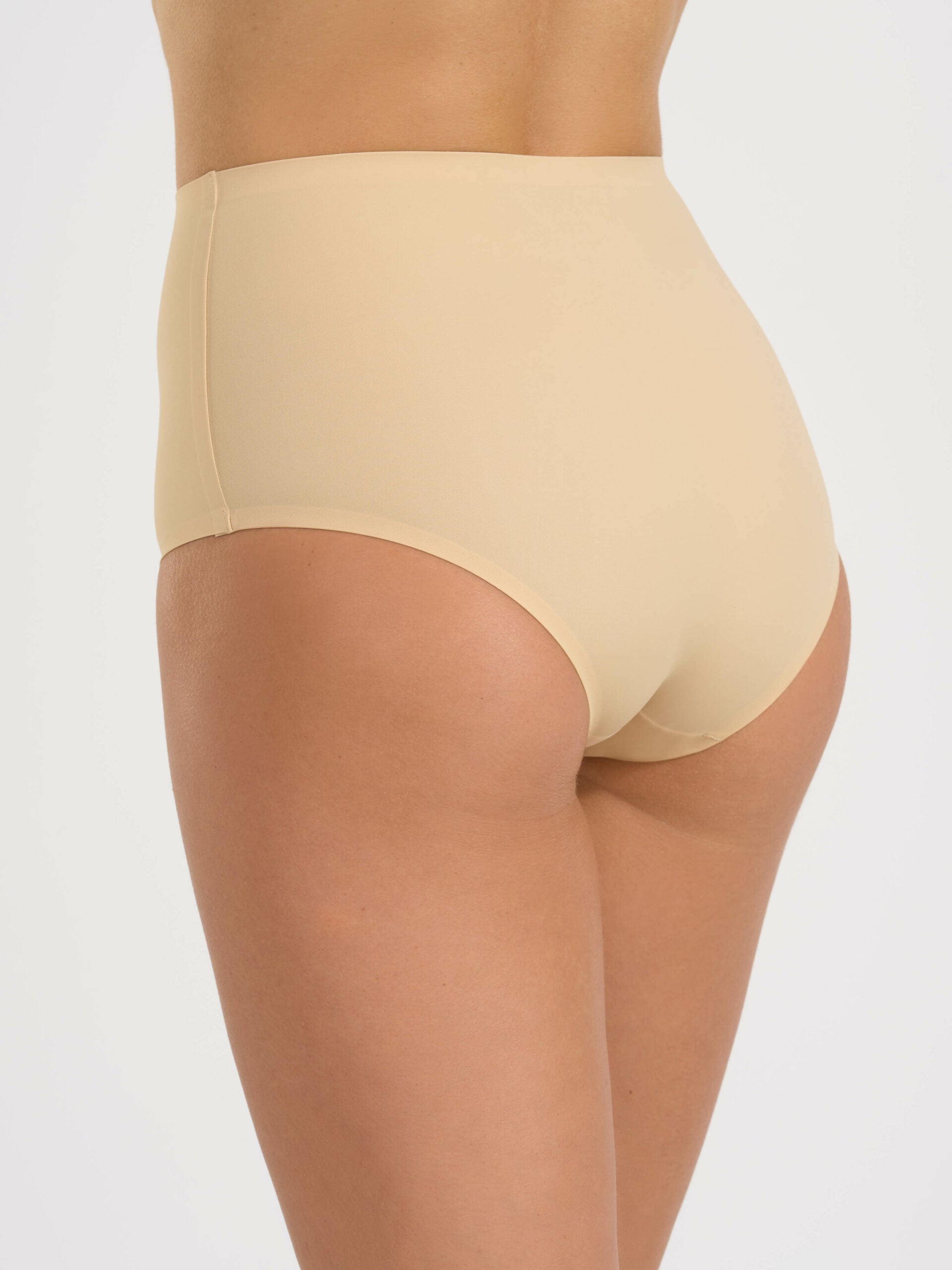 Guainetta in microfibra elasticizzata color nudo, vista posteriore.