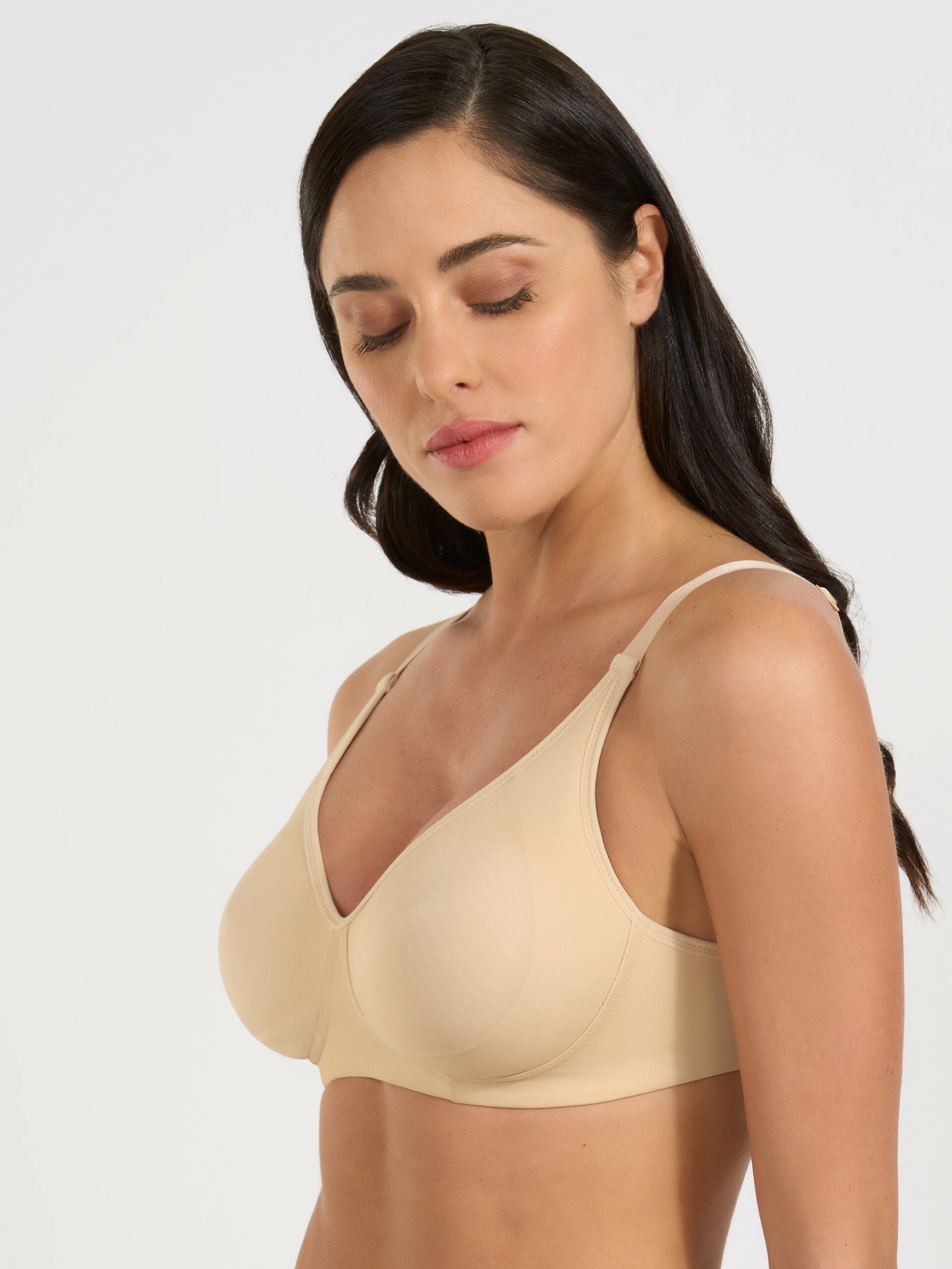 Reggiseno in microfibra nudo, coppe preformate e sostegno laterale interno.