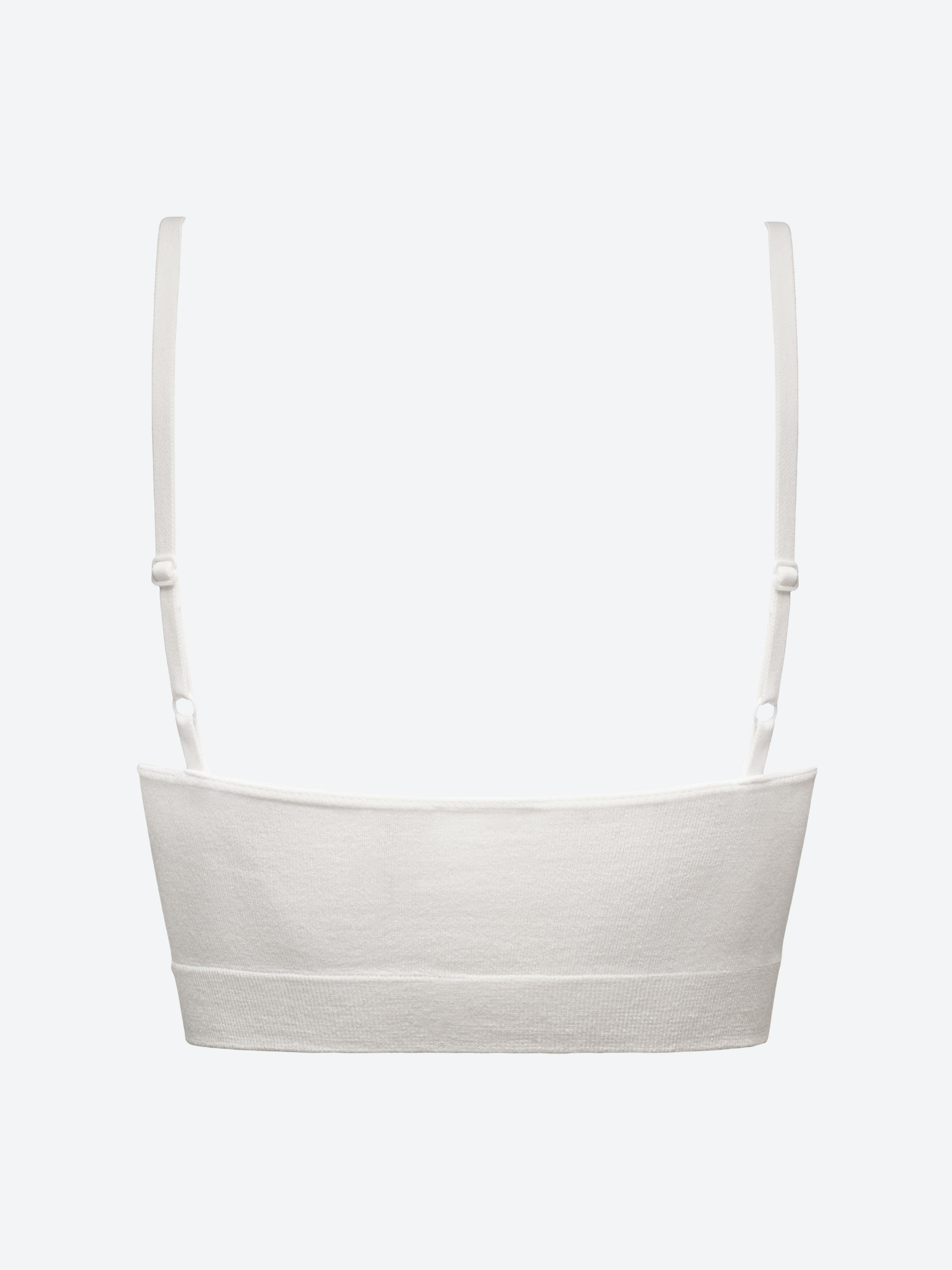 Bralette bianca in fibra di bamboo, spalline regolabili, effetto shape, vista posteriore.